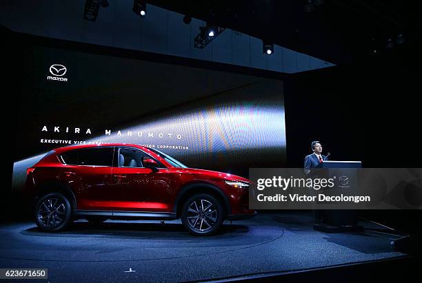 Akira Marumoto, Executive Vice President of Mazda, speaks onstage at the Mazda press conference event at the L.A. Auto Show on November 16, 2016 in...