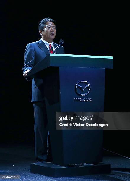 Akira Marumoto, Executive Vice President of Mazda, speaks onstage at the Mazda press conference event at the L.A. Auto Show on November 16, 2016 in...