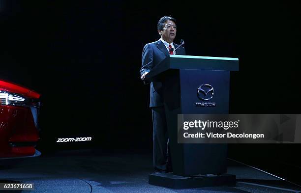 Akira Marumoto, Executive Vice President of Mazda, speaks onstage at the Mazda press conference event at the L.A. Auto Show on November 16, 2016 in...