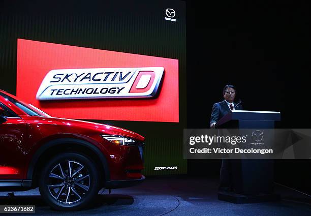 Akira Marumoto, Executive Vice President of Mazda, speaks onstage at the Mazda press conference event at the L.A. Auto Show on November 16, 2016 in...