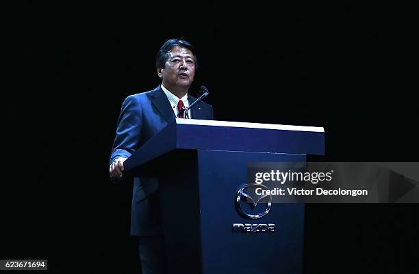 Akira Marumoto, Executive Vice President of Mazda, speaks onstage at the Mazda press conference event at the L.A. Auto Show on November 16, 2016 in...