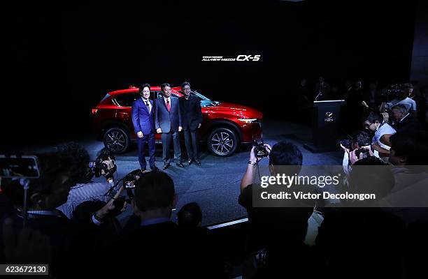 Masa Moro, President and CEO, Mazda North American Operations, Akira Marumoto, Executive Vice President of Mazda, and Ikuo Maeda, Global Head of...