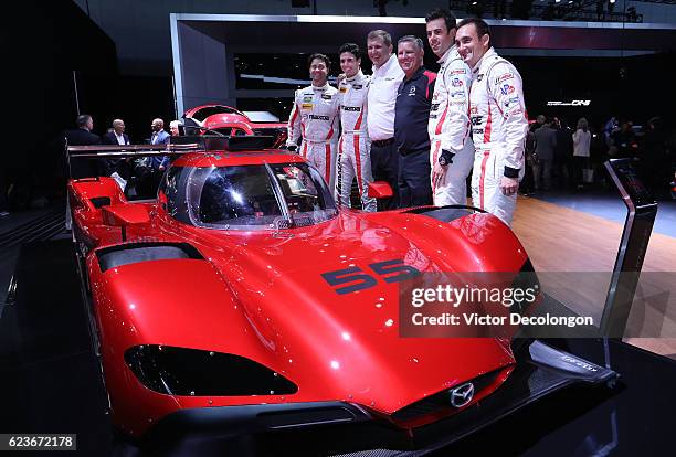 Mazda Motorsports drivers Jonathan Bomarito and Tristan Nunez, Mazda Motorsports Director John Doonan, Team Owner Sylvain Tremblay and Mazda...