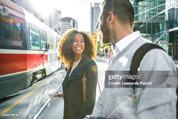 people meetup in downtown going to work in the morning - toronto stock pictures, royalty-free photos & images