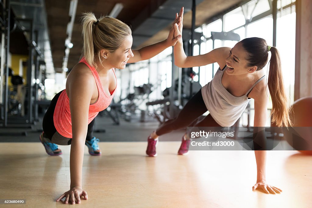 Beautiful women working out in gym