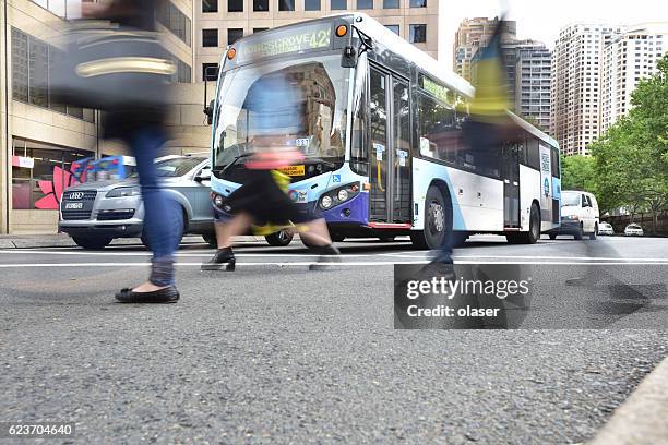 bus in city traffic, rush hour - sydney buses stock pictures, royalty-free photos & images