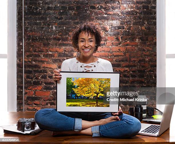 freelance photographer portrait - holding photo stock pictures, royalty-free photos & images