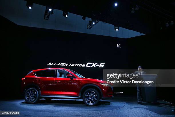 Akira Marumoto, Executive Vice President of Mazda, speaks onstage at the Mazda press conference event at the L.A. Auto Show on November 16, 2016 in...