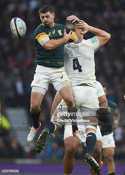 Willie Le Roux of South Africa and Joe Launchbury of England during the Old Mutual Wealth Series match between England and South Africa at Twickenham...