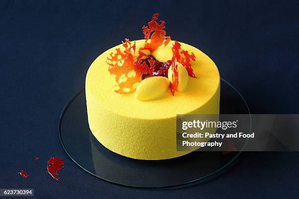 contemporary yellow velvet mousse cake - mousse dessert stock pictures, royalty-free photos & images