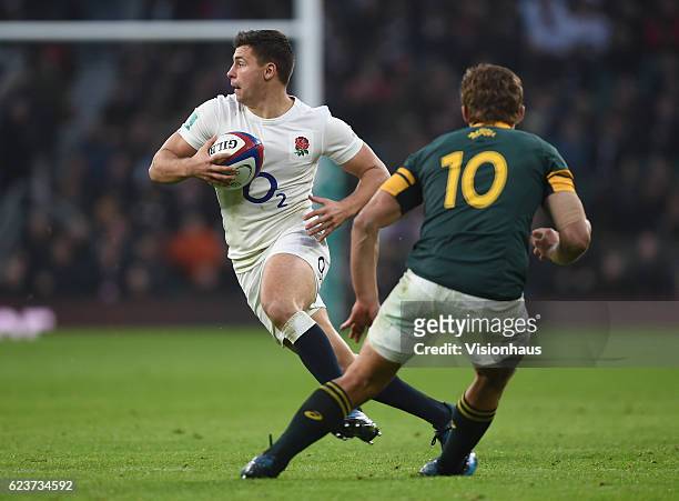 Ben Youngs of England sells a dummy to Pat Lambie of South Africa during the Old Mutual Wealth Series match between England and South Africa at...