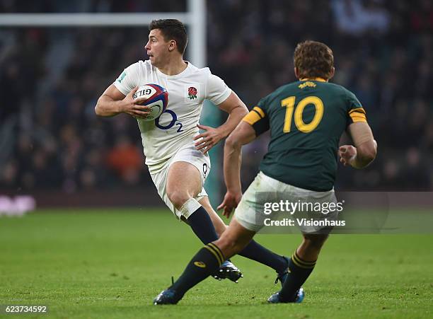 Ben Youngs of England sells a dummy to Pat Lambie of South Africa during the Old Mutual Wealth Series match between England and South Africa at...