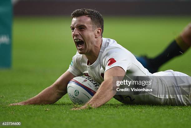 George Ford celebrates scoring a try for England during the Old Mutual Wealth Series match between England and South Africa at Twickenham Stadium on...