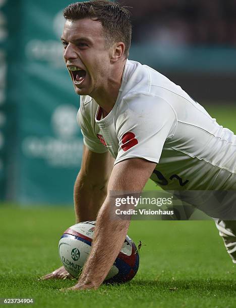 George Ford celebrates scoring a try for England during the Old Mutual Wealth Series match between England and South Africa at Twickenham Stadium on...