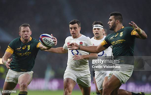 Ruan Combrinck and Damian de Allende of South Africa and George Ford of England during the Old Mutual Wealth Series match between England and South...