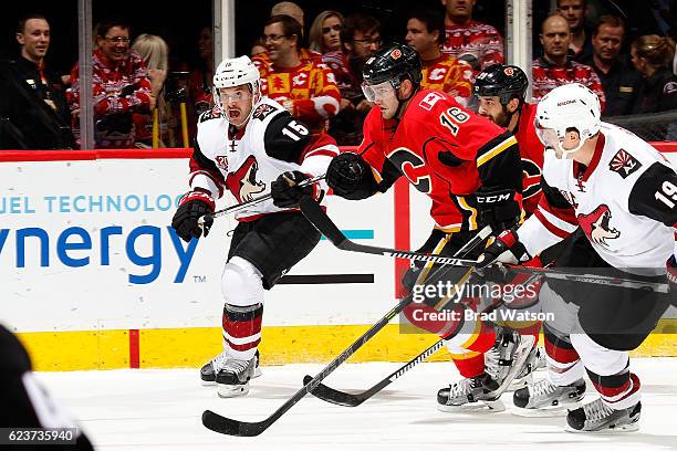 Linden Vey of the Calgary Flames skates against Brad Richardson of the Arizona Coyotes during an NHL game on November 16, 2016 at the Scotiabank...