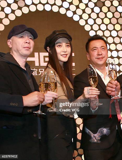 Director Feng Xiaogang, actress Fan Bingbing and Huayi Brothers Media Corp. CEO Wang Zhonglei attend an opening ceremony of HBC IMAX on November 16,...