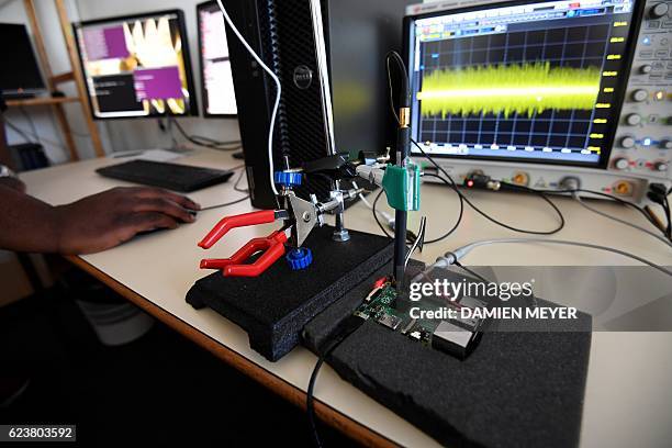 Researcher observes with a probe waves emitted by a microprocessor at the "LHS" of INRIA in Rennes on November 3, 2016. Paradise where computer...