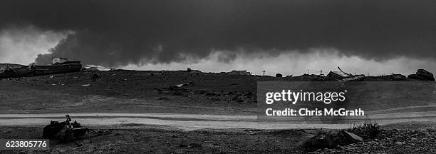 General view of the burnt landscape, scorched by airstrikes and covered in ash and oil from burning oil wells set on fire by fleeing ISIS members on...