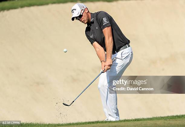 Danny Willett of England plays his third shot on the third hole during the first round of the DP World Tour Championship on the Earth Course at...