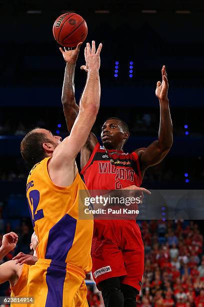 Casey Prather of the Wildcats lays up against Aleks Maric of the Kings of the Kings during the round seven NBL match between the Perth Wildcats and...