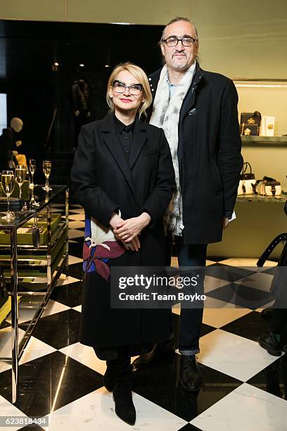 Evelina Khromtchenko and husband attends the screening of 'Past Forward', a movie by David O. Russell presented by Prada on November 16, 2016 in...