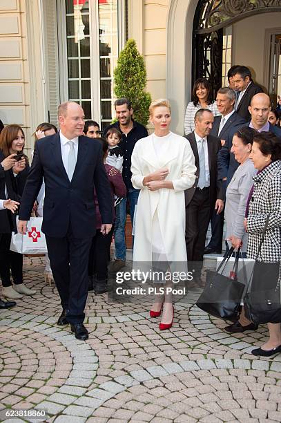 Prince Albert II of Monaco and Princess Charlene of Monaco attend the Parcels Distribution At Monaco Red Cross Headquarters on November 17, 2016 in...