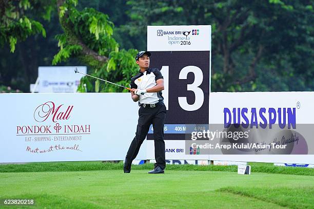 Natipong Srithong of Thailand plays a shot during round one of the BANK BRI-JCB Indonesia Open at Pondok Indah Golf Course on November 17, 2016 in...