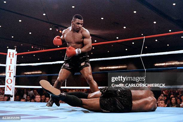 Mike Tyson fights against heavyweight champion Trevor Berbick to become the youngest heavyweight world champion in history on November 22, 1986 in...
