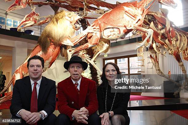 Gunther von Hagens, inventor of plastination, poses with his wife Angelina Walley and his son Rurik von Hagens during the 10th anniversary...