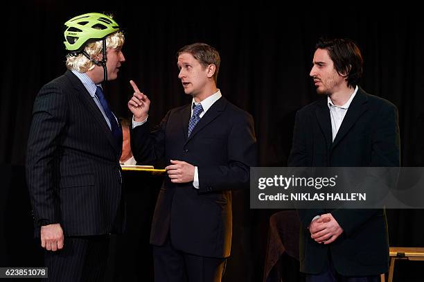 Actors James Sanderson playing Boris Johnson, Stephen Emery playing David Cameron, and Jack Bradley playing George Osborne perform during a dress...