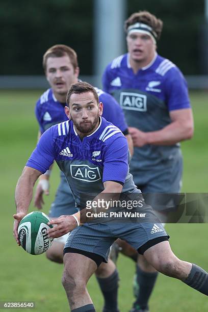 Aaron Cruden of the New Zealand All Blacks passes during a training session at the Westmanstown Sports Complex on November 17, 2016 in Dublin,...