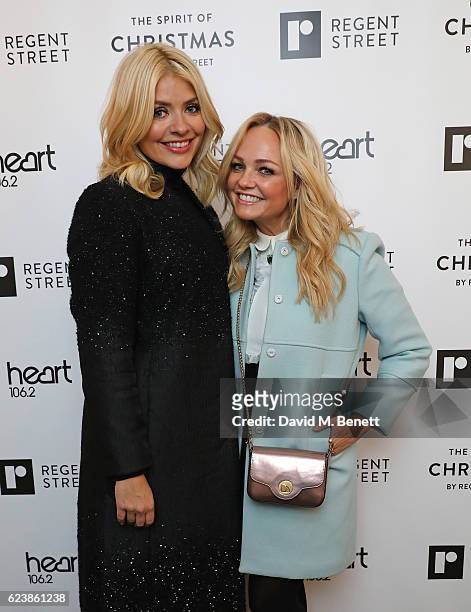 Holly Willoughby and Emma Bunton attend the Regent Street Christmas Lights switch on event with Heart at Regent Street on November 17, 2016 in...