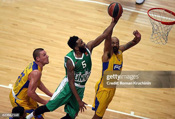 Keith Langford, #5 of Unics Kazan competes with Devin Smith, #6 and Colton Iverson, #24 of Maccabi Fox Tel Aviv during the 2016/2017 Turkish Airlines...