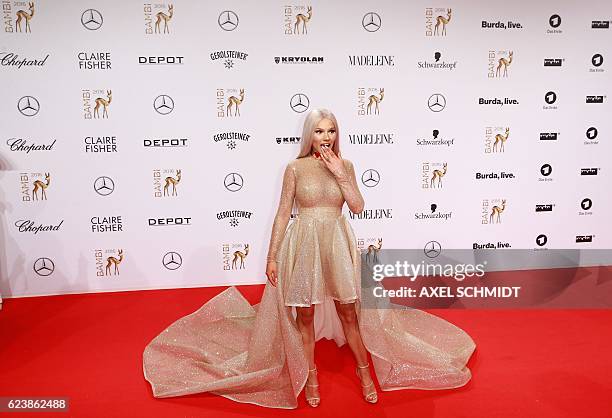 German beauty consultant Shirin David poses for photographers as she arrives at the Bambi awards on November 17, 2016 in Berlin. The Bambis are the...