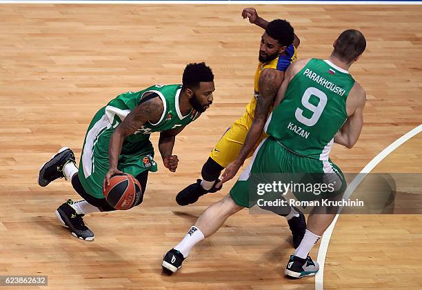 Keith Langford, #5 and Artsiom Parakhouski, #9 of Unics Kazan competes with D.J. Seeley, #4 of Maccabi Fox Tel Aviv during the 2016/2017 Turkish...