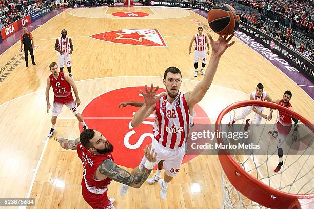 Ognjen Kuzmic, #32 of Crvena Zvezda mts Belgrade competes with Miroslav Raduljica, #11 of EA7 Emporio Armani Milan during the 2016/2017 Turkish...