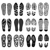 The collection of a shoeprints. Shoes silhouette black and white