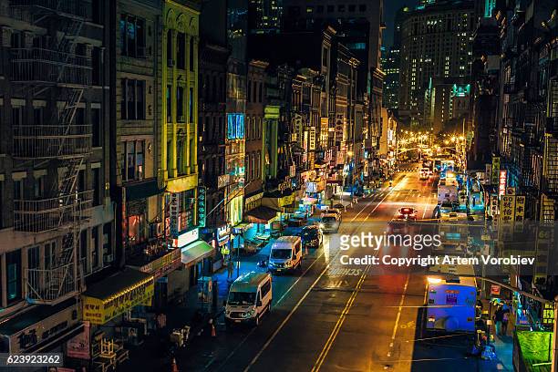 chinatown at night - lower east side manhattan stock pictures, royalty-free photos & images