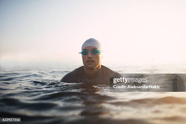 portrait of a swimmer - sea swimming stock pictures, royalty-free photos & images