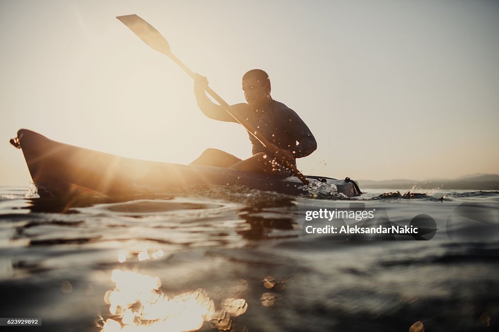 Silhouette of a canoeist