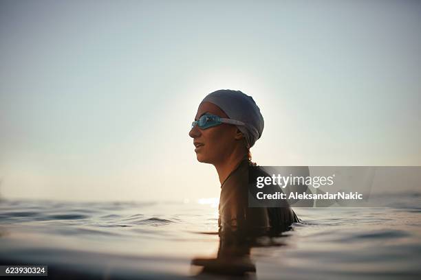 portrait of a swimmer girl - sea swimming stock pictures, royalty-free photos & images