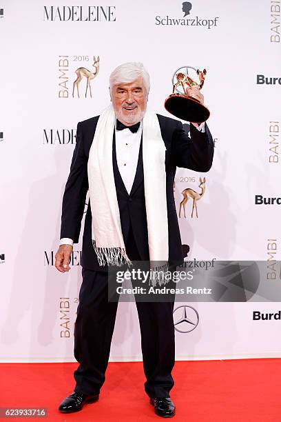 Mario Adorf poses with award at the Bambi Awards 2016 winners board at Stage Theater on November 17, 2016 in Berlin, Germany.