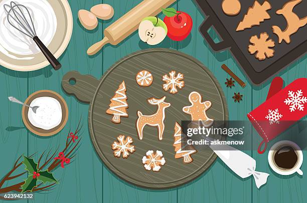 ilustraciones, imágenes clip art, dibujos animados e iconos de stock de galletas de navidad  - decorating a cake