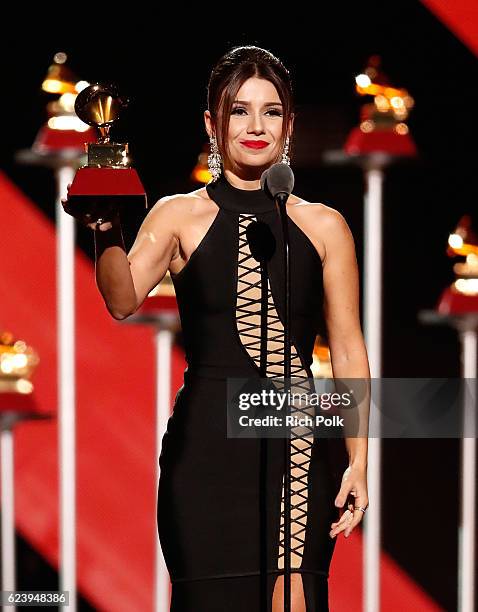 Recording artist Paula Fernandes accepts the Best Sertaneja Music Album onstage during The 17th Annual Latin Grammy Awards Premiere Ceremony at MGM...