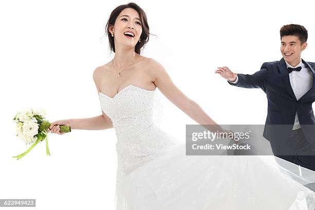 bride and groom - bride running stock pictures, royalty-free photos & images