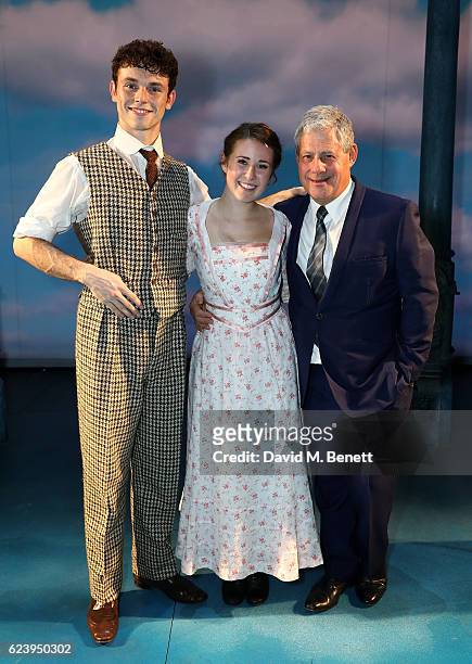 Charlie Stemp, Devon-Elise Johnson and Cameron Mackintosh bow at the curtain call during the press night performance of "Half A Sixpence" at the Noel...
