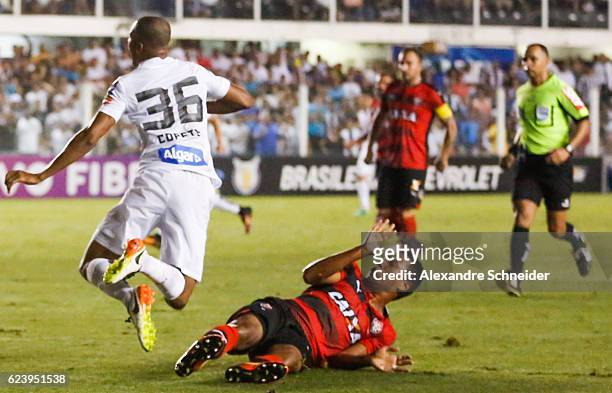 Copete of Santos receives a fault during the match between Santos and Vitoria for the Brazilian Series A 2016 at Vila Belmiro stadium on November 17,...