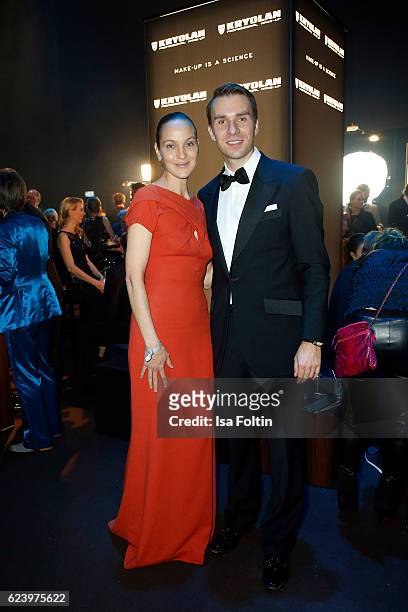 Jeanette Hain and Dominik Langer, director Kryolan pose at the Bambi Awards 2016 party at Atrium Tower on November 17, 2016 in Berlin, Germany.