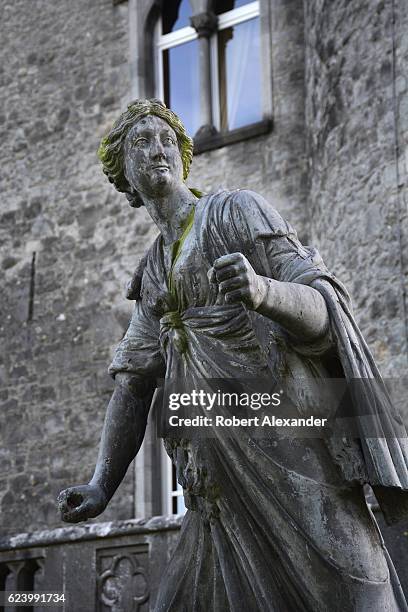 August 29, 2016: A 17th-century lead statue of Diana, in Roman mythology the goddess of the hunt, the moon and birthing, stands beside the...